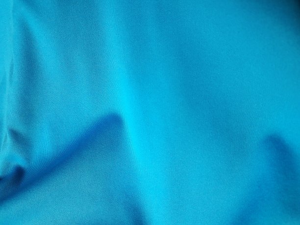 蓝色的织物。素材图片