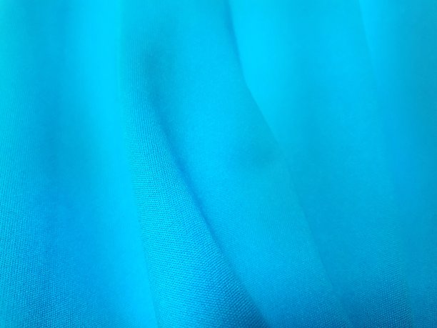 蓝色的织物。素材图片