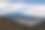 富士山(日语叫富士山)是日本著名的山峰，在夜晚的蓝天下高耸入云，前景是川口吾镇和湖图片下载