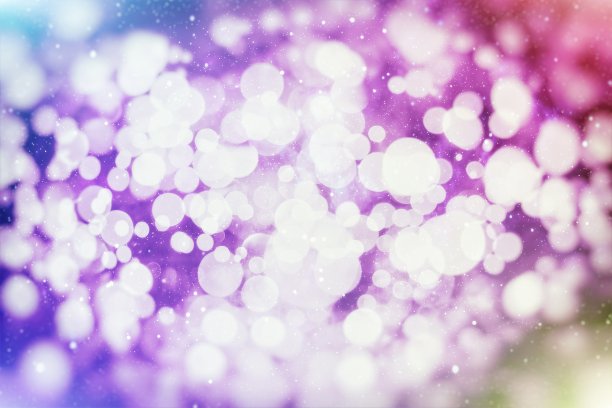 闪闪发光的灯泡灯光背景:模糊的圣诞墙纸装饰理念。节日背景:闪烁圈点亮庆典展示。图片下载