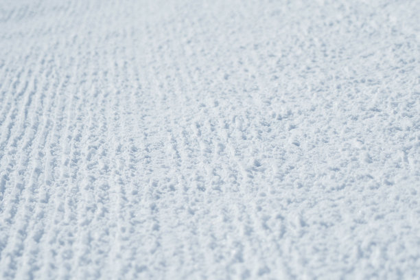 冬天的照片。滑雪道上被践踏的雪的纹理。明亮的抽象背景适合任何设计图片下载