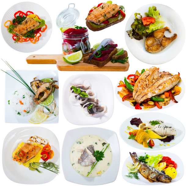 不同的菜肴与鱼在盘子孤立的白色背景图片下载