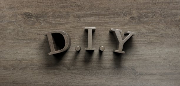 木头背景上的diy字图片下载