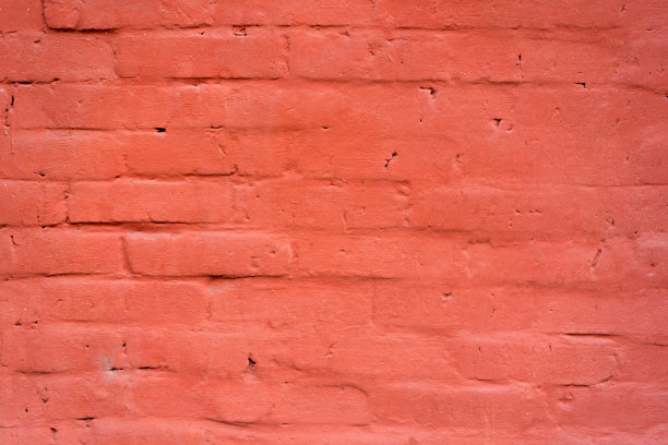 用浓红色油漆涂的砖墙图片下载