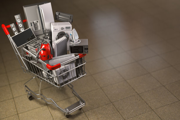 家电在购物车里。电子商务或网上购物的概念。图片下载