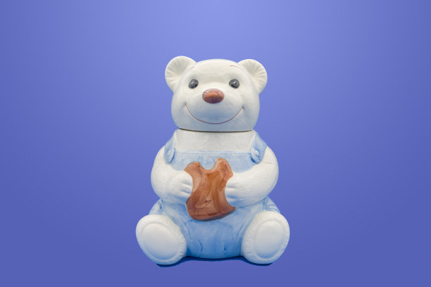 微笑的泰迪熊饼干罐图片下载