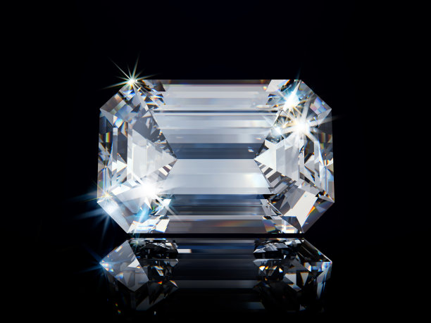 闪闪发光的祖母绿切割钻石在黑色光泽的背景图片下载