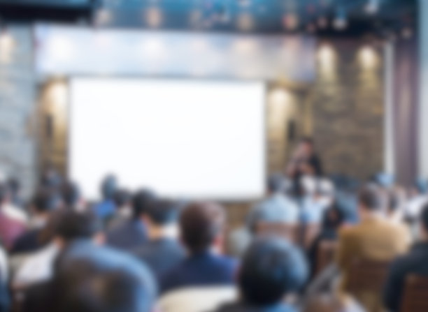 商务会议照片。执行发言人在台上。在科技企业家会议上的演讲。有观众的企业活动。专家研讨报告会活动。图片下载