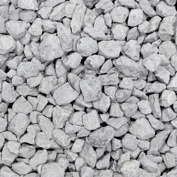 背景来自一个圆形的白色石头。白色的鹅卵石折叠。广场的照片。图片下载