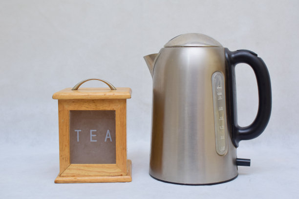 木制茶叶盒和不锈钢电热水壶图片下载