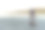 小小的沙漏显示时间在美丽的沙滩上流淌。图片下载