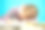 孤立的孩子与不良姿势坐在书桌和做家庭作业。女孩把头靠在桌子上，在笔记本上写字。图片下载