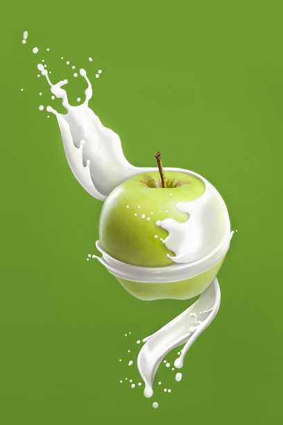 绿苹果在牛奶溅在绿色的背景。图片下载