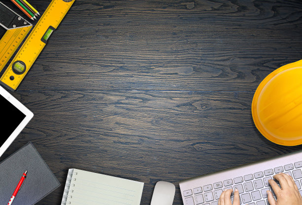 办公室办公桌背景与建设项目理念概念，有笔记本电脑，绘图设备和一杯咖啡图片下载