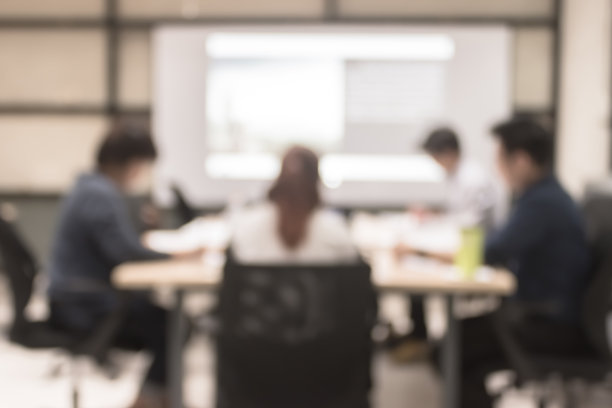 模糊办公室会议背景商务人员工作组在会议室的讨论图片下载