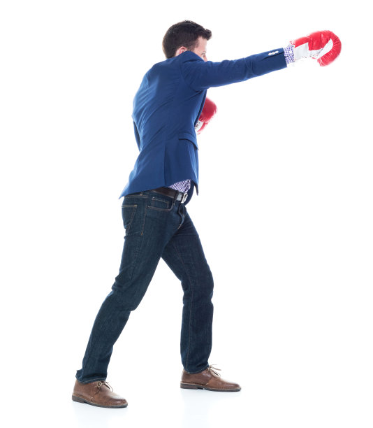 侧视图有吸引力的商人拳击图片下载