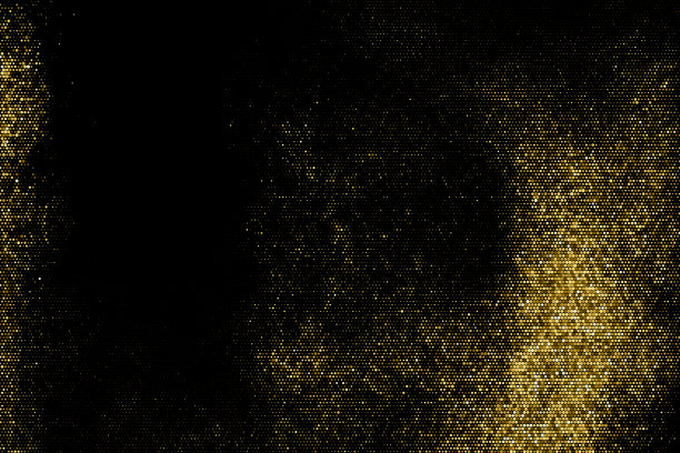 金色闪光半色调虚线背景。图片下载