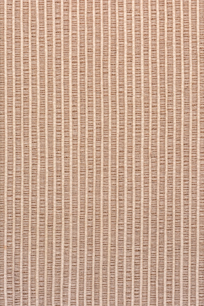 粗密罗纹织物的质地。沙发家具特写。棕色空白背景布局。垂直的照片。图片下载