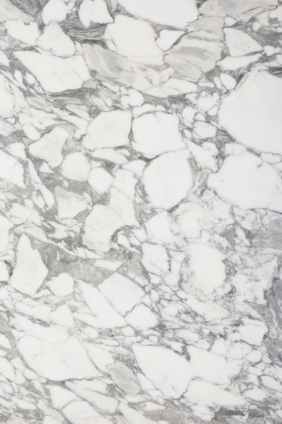 特写白色大理石与自然图案纹理背景。垂直的照片。图片下载