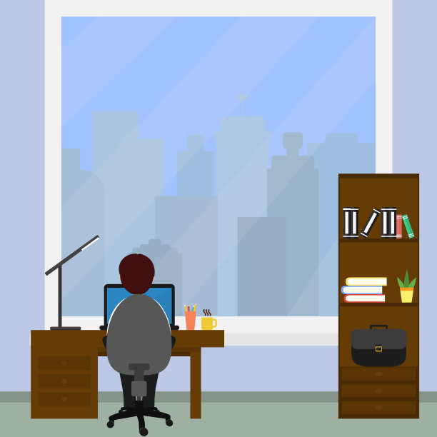 男商人坐在办公室的电脑前工作。图片下载