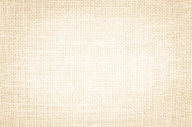 米色抽象织物或奶油色纹理背景。图片下载