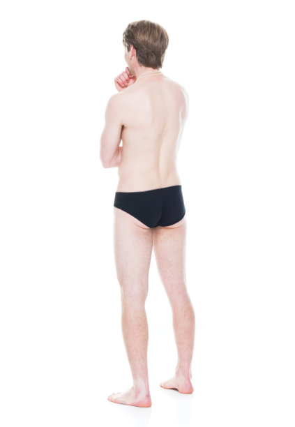 穿着三角裤和护目镜的帅气男性游泳运动员图片下载