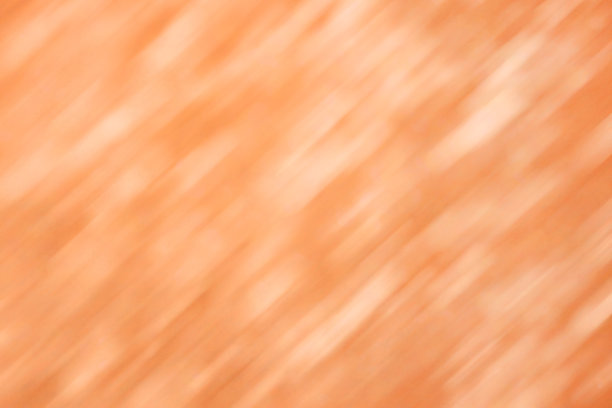 橙色散焦光背景与对角线笔画图片下载