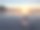 在夕阳的背景下，贝加尔湖上的冰冻冰块图片下载