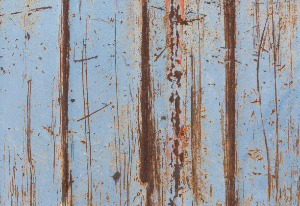 锈迹斑斑的金属背景，带有裂缝，粗糙的纹理。纹理用生锈的金属着色。图片下载