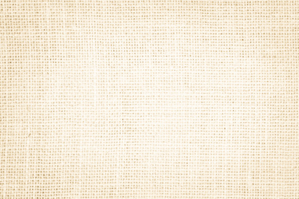 米色抽象织物或奶油色纹理背景。图片下载