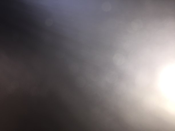 银色的散景背景与光线图片下载