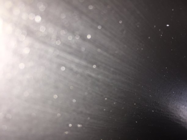 银色的散景背景与光线图片下载