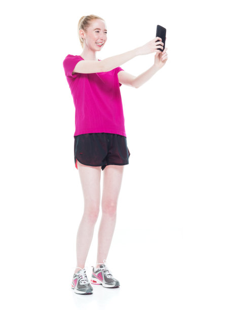 美丽的女性在运动服装-图片下载