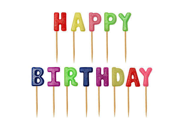 彩色碑文生日快乐的木棍孤立在白色的背景图片下载