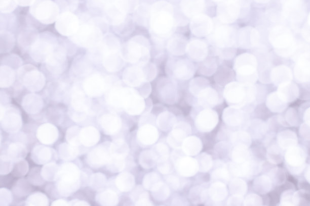 银光闪烁的节日背景与散景灯。庆祝概念的节日和周年素材图片