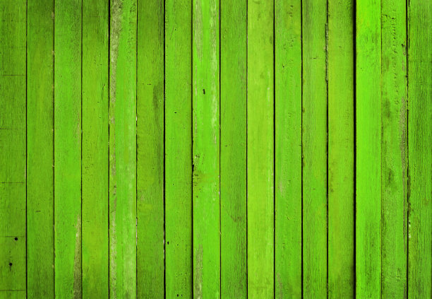 明亮的绿色木墙背景，树皮木材纹理与古老的自然图案设计艺术作品。图片下载