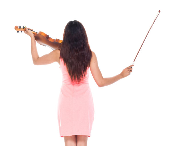 后视图美丽的女性拉小提琴图片下载