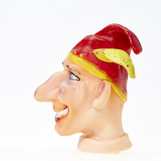 手指打拳木偶，戴红帽子的小丑，侧视图图片下载