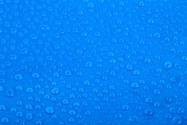 蓝色背景上的水滴图片下载