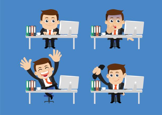 商务人士坐在他的桌子前图片下载