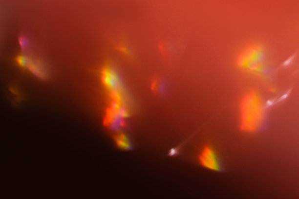 镜头光晕散焦光线模糊了红色的太阳光线图片下载