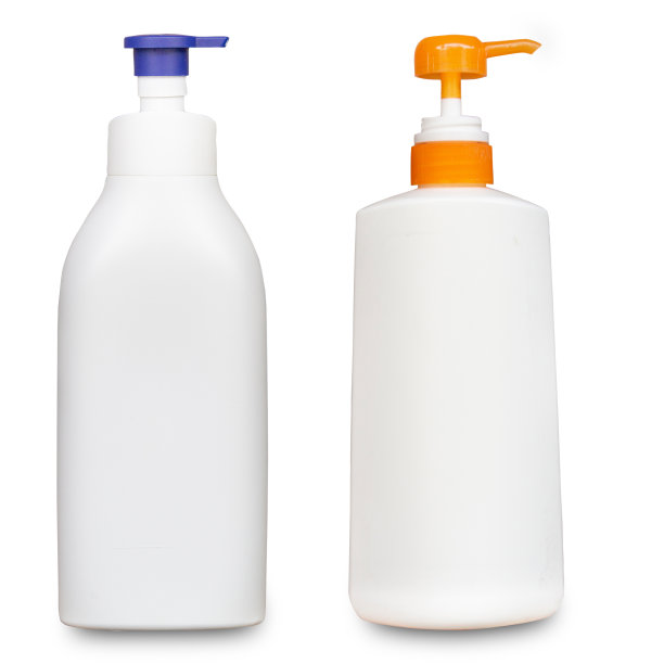 塑料淋浴膏瓶隔离在白色的黑色地板上，带有剪接路径图片下载