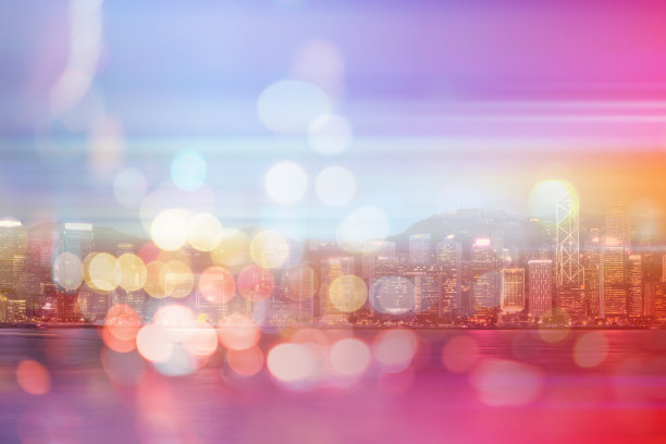 抽象的以城市为背景的彩色圆形散景。双重曝光图片下载