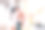 男人和女人紧密地站在一起。女孩拥抱的人。她的手放在他的屁股上。他们互相触摸对方的前额。人在恋爱。男人靠向桌子。图片下载