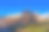 新西兰南阿尔卑斯山的山地景观。在蓝色背景下隔离图片下载