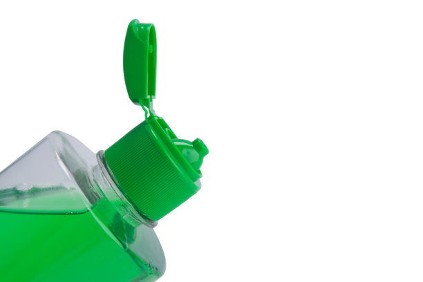 特写，打开洗发器，绿色，在白色的背景上，在右边有一个地方的题字图片下载