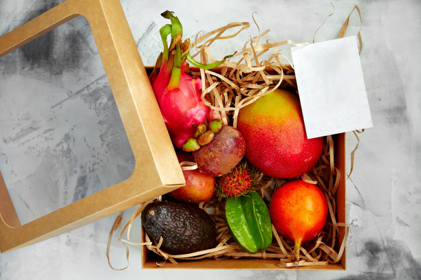 异国情调的水果包装盒概念设计。饮食营养的概念。木瓜热带图片下载