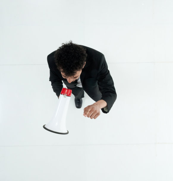 商人拿着扩音器图片下载