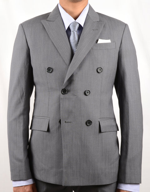 穿着正式灰色羊毛套装的时尚男士。双排扣夹克样式。图片下载