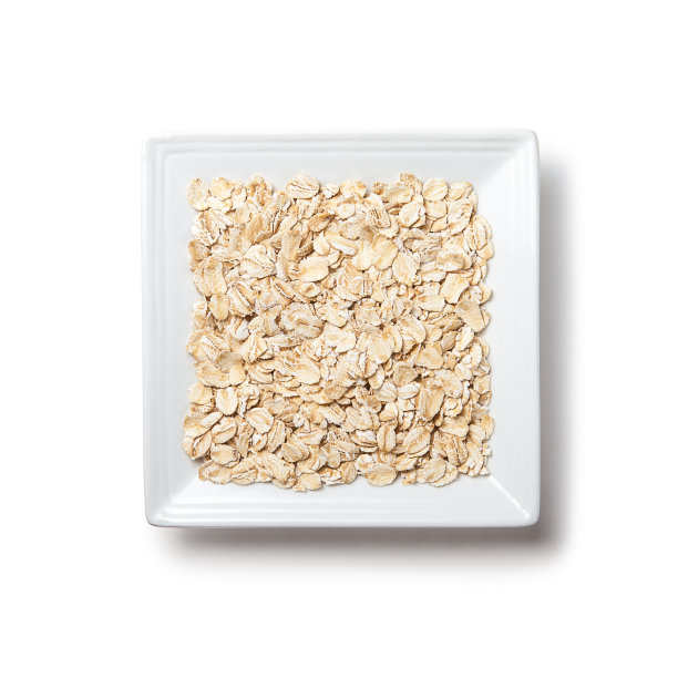 燕麦片放在白色盘子上图片下载